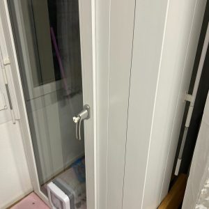 Cat door fitted into a patio door panel